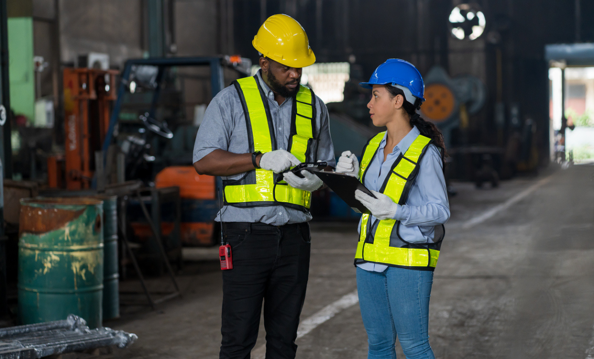 2 workers wearing safety helmets