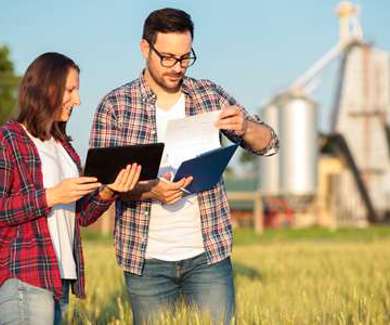 Man and woman on farmland